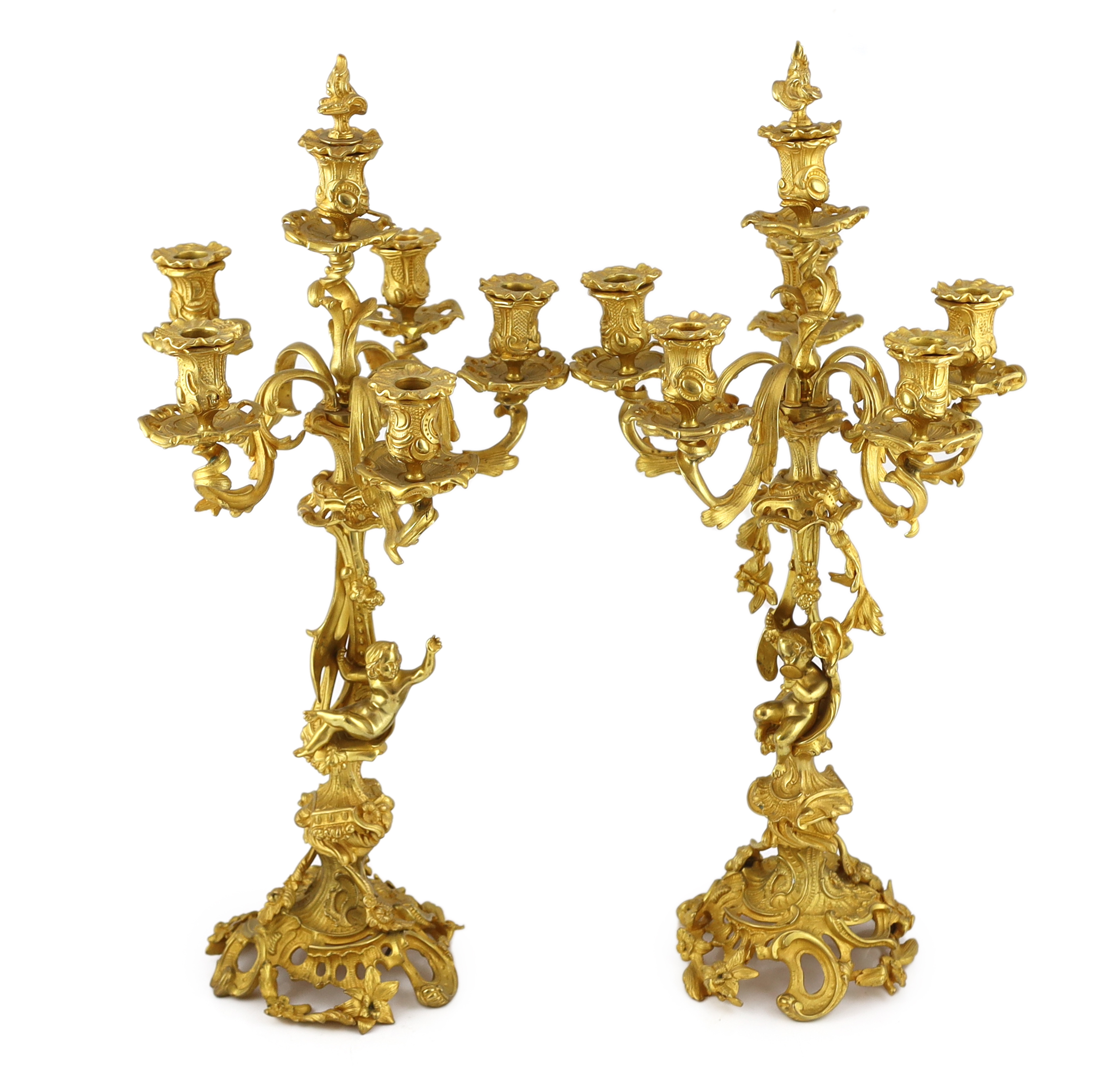 A pair of Victorian style ormolu six light candelabra 66cm high